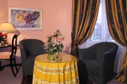 Hotel Capitole Женева Номер фото